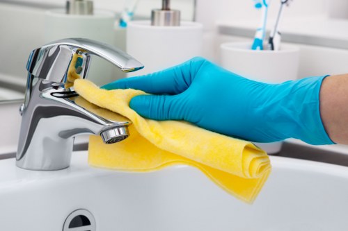 Cleaner working in a Kingston townhouse living room